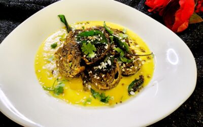 Colocasia Rolls in Turmeric Yogurt