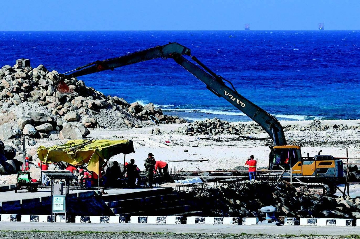 Workers are seen at a construction site on Thitu Island in the disputed South China Sea
on Friday, Dec. 1, 2023. AFP PHOTO