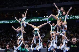 The FEU Cheering Squad PHOTO BY RIO DELUVIO