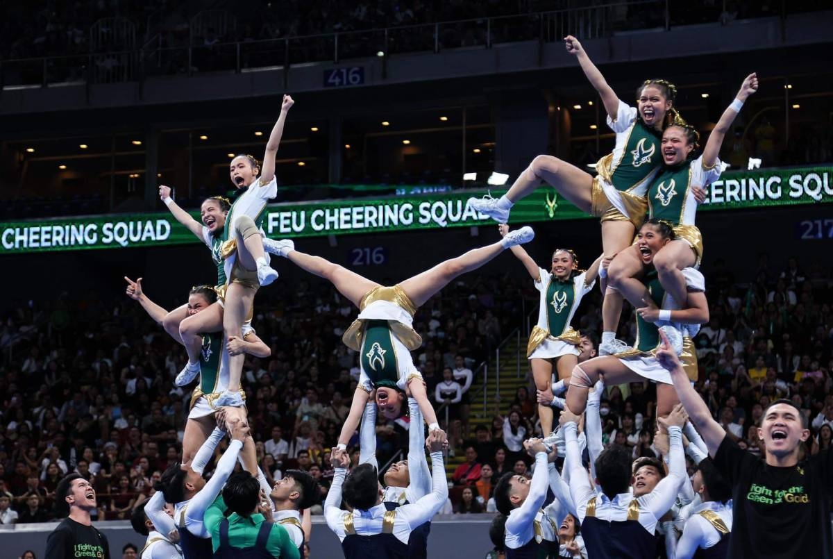 The FEU Cheering Squad PHOTO BY RIO DELUVIO
