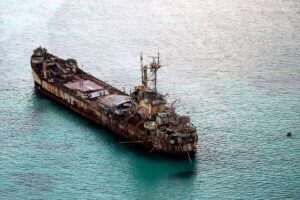 This shows the BRP Sierra Madre of the Philippine Navy anchored near Ayungin Shoal with Filipino soldiers onboard to secure perimeter in the Spratly Islands in the West Philippine Sea on May 11, 2015. PHOTO BY RITCHIE B. TONGO/POOL PHOTO VIA AP