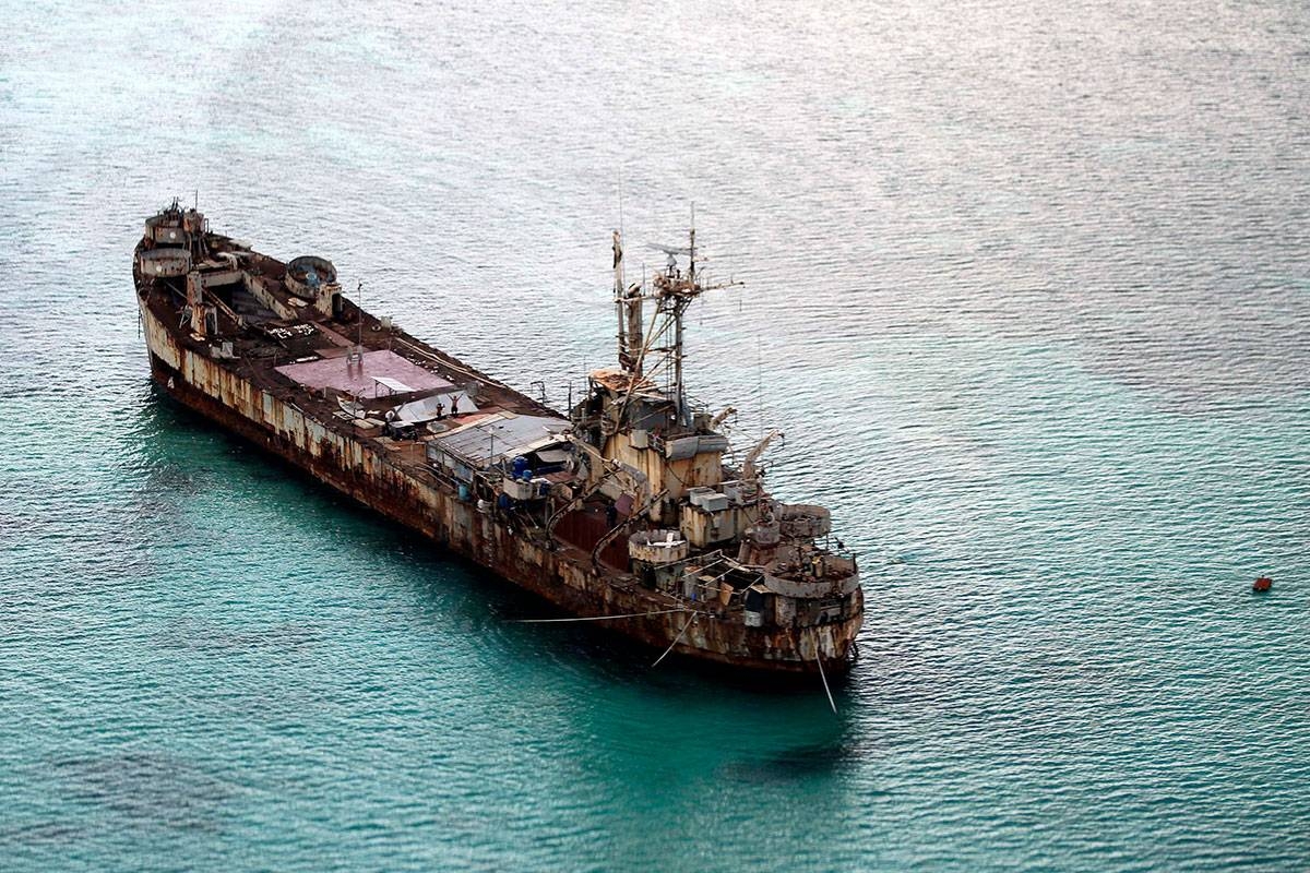 This shows the BRP Sierra Madre of the Philippine Navy anchored near Ayungin Shoal with Filipino soldiers onboard to secure perimeter in the Spratly Islands in the West Philippine Sea on May 11, 2015. PHOTO BY RITCHIE B. TONGO/POOL PHOTO VIA AP