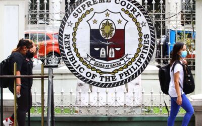 270422_SUPREMECOURT-ALQUINTO People walk past the logo of Philippine Supreme Court along Padre Faura Avenue in Manila, on 27 April 2022. PHOTO BY MIKE ALQUINTO