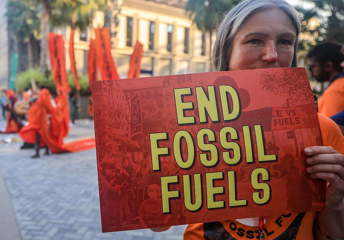 Activists protest against fossil fuels on the sidelines of the COP28 United Nations climate summit in Dubai on December 5, 2023. Karim SAHIB / AFP