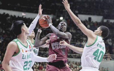 La Salle and UP Face Off in UAAP Season 86 Finals Decider UP’s Malick Diouf rebounds against La Salle players during the UAAP Season 86 basketball finals Game 2 at the Smart Araneta Coliseum on Sunday, Dec. 3, 2023. PHOTO BY RIO DELUVIO