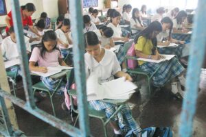 In this file photo, Grade six pupils of Commonwealth Elementary School in Quezon City are taking a National Achievement Test. File Photo