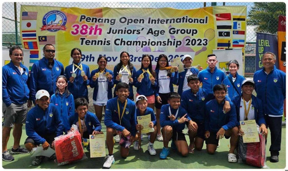 The Unified Tennis Philippines (UTP) players and coaches show off their medals at the 38th Penang Open International Juniors Tennis Championships in Malaysia. CONTRIBUTED PHOTO