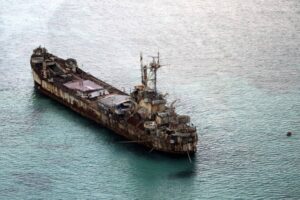 This shows the BRP Sierra Madre of the Philippine Navy anchored near Ayungin Shoal with Filipino soldiers onboard to secure perimeter in the Spratly Islands in the West Philippine Sea on May 11, 2015. PHOTO BY RITCHIE B. TONGO/POOL PHOTO VIA AP