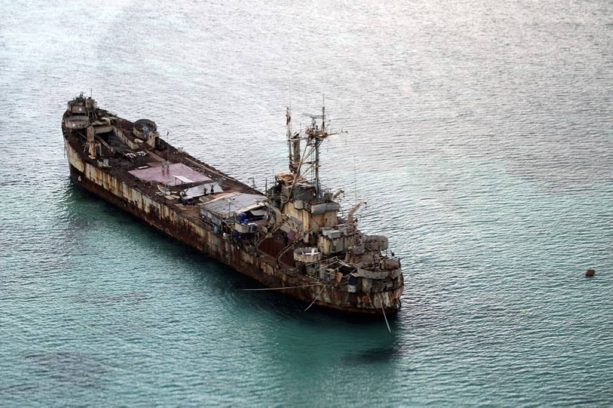 This shows the BRP Sierra Madre of the Philippine Navy anchored near Ayungin Shoal with Filipino soldiers onboard to secure perimeter in the Spratly Islands in the West Philippine Sea on May 11, 2015. PHOTO BY RITCHIE B. TONGO/POOL PHOTO VIA AP