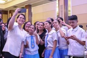 Vice President Sara Duterte poses with students and Education officials during the culmination of the observance of National Children’s Month on Nov. 27,2023.