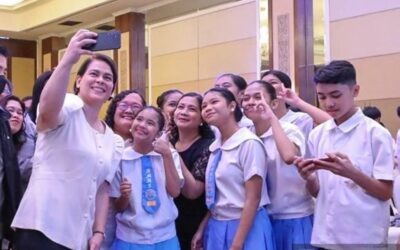 Vice President Sara Duterte poses with students and Education officials during the culmination of the observance of National Children’s Month on Nov. 27,2023.