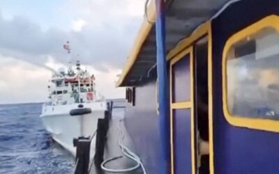 AHOY! This handout photo taken and released on Dec. 10, 2023, by the Philippine Coast Guard (PCG) shows a China Coast Guard vessel (right) using water cannon against the M/L Kalayaan chartered supply boat during a mission to deliver provisions at Second Thomas Shoal in disputed waters of the South China Sea (SCS). A Philippine boat was ‘rammed’ by a Chinese coast guard ship during a resupply mission on Sunday, the PCG said, in the latest such confrontation in the disputed SCS. AFP PHOTO