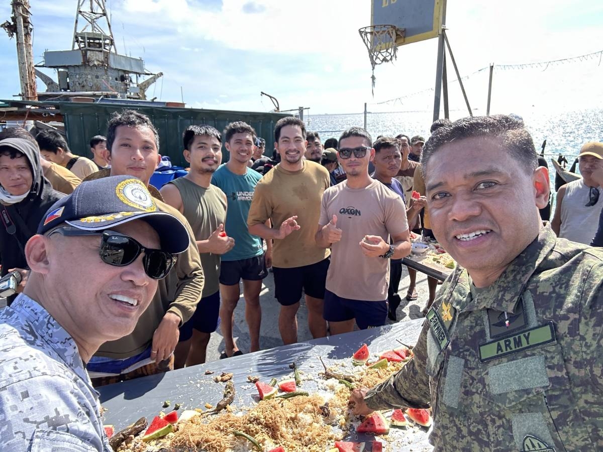 AFP Chief of Staff General Romeo Brawner Jr. shares lunch with the personnel of the BRP Sierra Madre on December 10, 2023. AFP photo