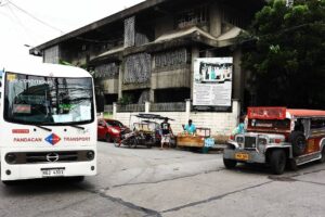 In this file photo A modern public utility vehicle (MPUV) and traditional passenger jeep (PUJ) are seen waiting for passengers at the corner of Leon Guinto Street in Manila. PHOTO BY MIKE ALQUINTO