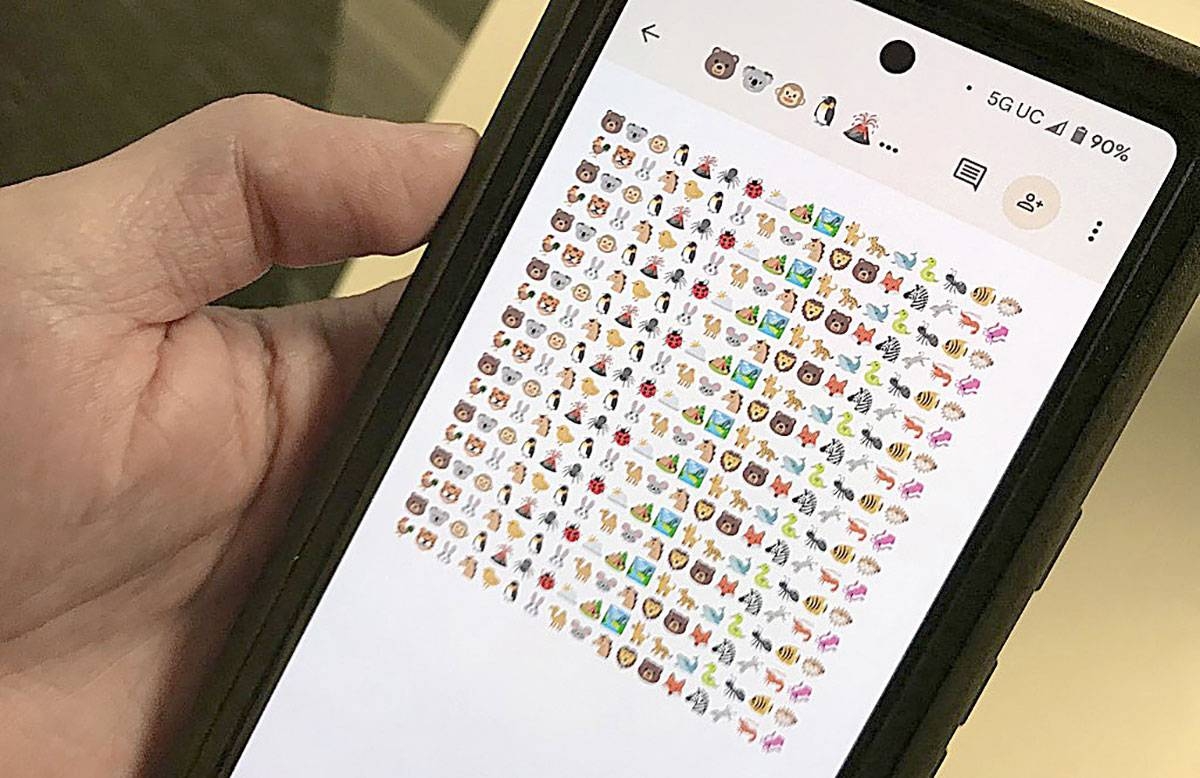 This photo illustration created on Monday, Dec. 11, 2023, shows emojis on a smartphone screen in Washington, D.C. AFP PHOTO