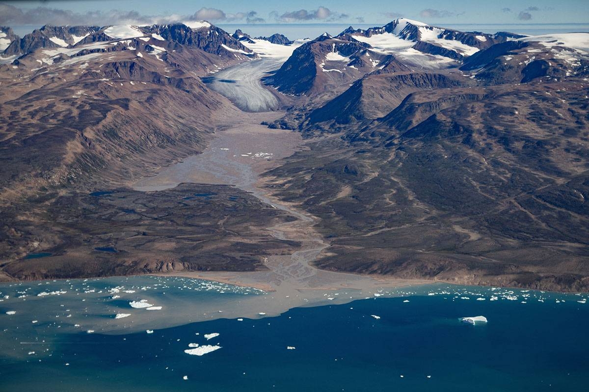 This aerial photograph taken on August 11, 2023 shows a glacier around "Constable Point" severely melted due to warm temperatures along the Scoresby Sound Fjord, in Eastern Greenland. The Arctic saw its warmest ever summer in 2023, the result of accelerating human-caused climate change that is pushing ecosystems and the people that depend on them into uncharted territory, according to an official report on December 12, 2023. Average summer surface air temperature from the months of July-September was 43 degrees Fahrenheit (6.4 Celsius), the highest since records began in 1900.

Olivier MORIN / AFP