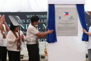 WATER TREATMENT PLANT MARKER President Ferdinand Marcos Jr. (center), with Maynilad Water Services Inc. Chairman Manuel V. Pangilinan (right), unveils the marker of the new Poblacion Water Treatment Plant during its inauguration in Muntinlupa City on Friday, Dec 15, 2023. Also present were (from left) Maynilad President and CEO Ramoncito Fernandez, Environment and Natural Resources Secretary Maria Antonia Yulo-Loyzaga, and Metropolitan Water Works and Sewerage System (MWSS) Administrator Leonor Cleofas (not in photo). PHOTO BY RENE H. DILAN