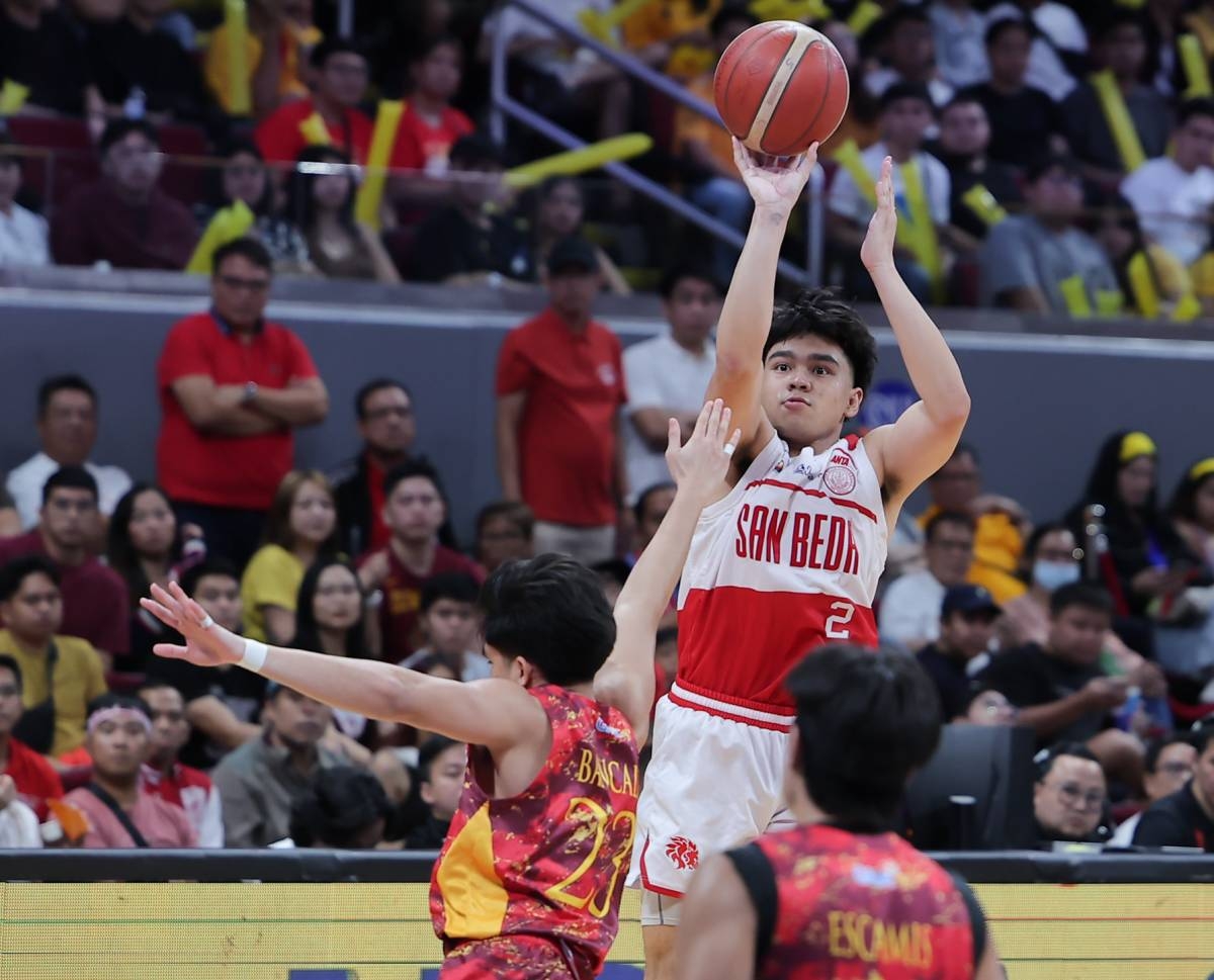 San Beda's Jacob Cortez tries to score against Mapua's Jeco Bancale during the NCAA Season 99 men's basketball finals game 2 at the Mall of Asia Arena in Pasay, December 10, 2023. Photo by Rio Deluvio