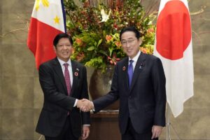 Japan's Prime Minister Fumio Kishida (right) shakes hands with President Ferdinand Marcos Jr. during their bilateral meeting, on the sidelines of the Asean-Japan Summit, at the prime minister's official residence in Tokyo on December 17, 2023. PHOTO BY FRANCK ROBICHON / POOL / AFP
