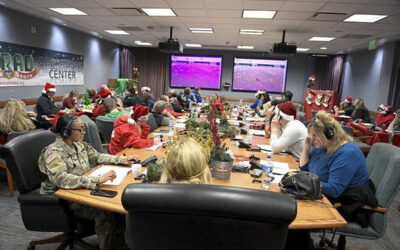 TRACKING SANTA Volunteers answer phone calls and emails from children around the world during the annual Norad Tracks Santa event on Peterson Air Force Base in Colorado Springs, Colorado, on Christmas Eve on Dec. 24, 2022. UNITED STATES DEPARTMENT OF DEFENSE PHOTO VIA AP
