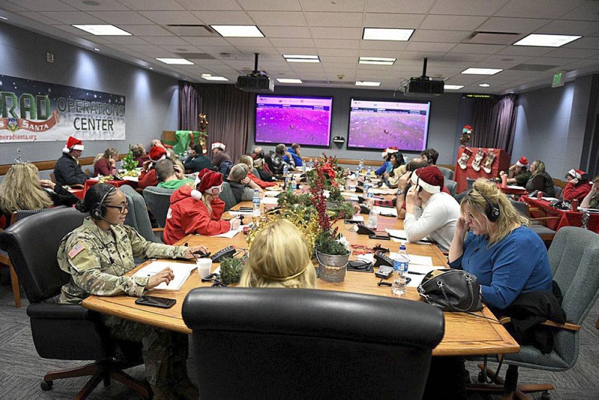 TRACKING SANTA Volunteers answer phone calls and emails from children around the world during the annual Norad Tracks Santa event on Peterson Air Force Base in Colorado Springs, Colorado, on Christmas Eve on Dec. 24, 2022. UNITED STATES DEPARTMENT OF DEFENSE PHOTO VIA AP