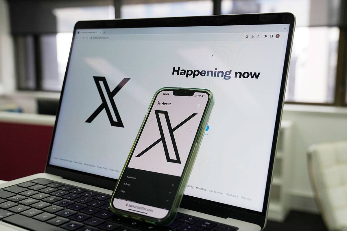 PUNISHED The opening page of X is displayed on a computer and phone in Sydney on Monday, Oct. 16, 2023. Formerly known as Twitter, X was fined $385,000 by ESafety, Australia’s online safety watchdog, for failing to explain how it tackles child sexual exploitation on its social media platform. AP PHOTO