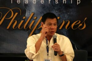 Davao City Mayor Rodrigo Duterte talks at the Asia CEO Forum in Makati on Thursday, June 25. Supporters have been pushing for Duterte, known for his hardline policy against criminal elements, to run for president in next year's elections. Photo by RENE H. DILAN