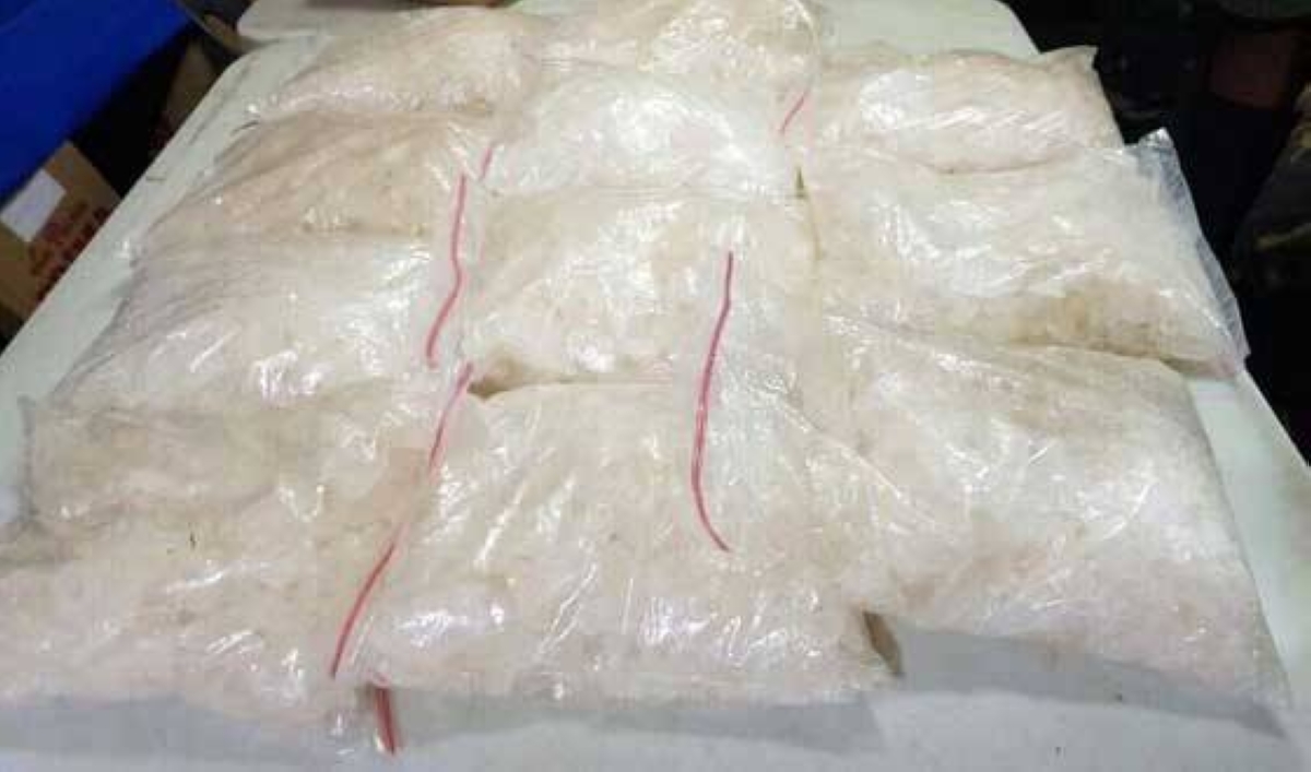 This undated photo shows confiscated bags of methamphetamine, some of which would have been turned into pills, possibly like the 33 million pills seized in Laos on Friday, Sept. 23, 2022. TMT FILE PHOTO