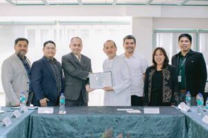 The agreement for the rehabilitation of the De La Salle Santiago Zobel School football field was signed by YKQ Foundation Chairman Anthony Quiambao and DLSZ President Br. Bernard Oca. From left are Alloprene Angelo Adlawan, Dave Macias, Quiambao, Oca, Rafael Javier Reloza, Ma. Teresa Castañeda and Joneil Dulay. CONTRIBUTED PHOTO