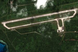 This January 10, 2022 satellite image released on December 28, 2023 by Maxar Technologies shows the Tinian airfield in the Mariana Islands. In the middle of the Pacific ocean, an abandoned US airfield once key to dropping the nuclear bomb on Japan -- and nearly lost to history amid encroaching forest -- is being revived. But as the Americans hack away at the jungle overgrowth at Tinian island airfield and other old, World War II-era bases across the region, it won't be with Japan on their mind. Rather, it's Beijing's growing influence in the Pacific that is spurring the recovery of a slew of abandoned runways on the 40 square-mile speck of land that makes up Tinian, part of the US overseas territory of the Northern Mariana Islands. "Rehabilitation of World War II-era airfields has provided Pacific Air Forces (PACAF) a rapidly executable avenue to enhance infrastructure in the region," a spokesperson told AFP. Handout / Satellite image ©2023 Maxar Technologies / AFP