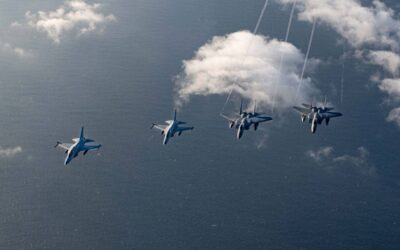 Asean Ministers Express Concern Over South China Sea Tensions In this handout photo taken on November 21, 2023 received through the US embassy in Manila on November 23 shows two Philippine Air Force FA-50s (L) flying alongside two US Air Force F-15C Eagles over the South China Sea during the joint maritime and air patrols. US and Philippine troops began joint maritime and air patrols off the Southeast Asian country on November 21, President Ferdinand Marcos said, as the countries seek to counter China's growing assertiveness in the region. Airman 1st Class Alexis Redin / US AIR FORCE / AFP