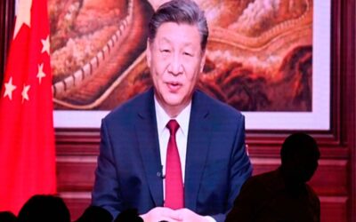 China’s President Xi Jinping Expresses Willingness to Foster Stable Relationship with the United States People have their dinner at a restaurant as a screen broadcasts China's President Xi Jinping while delivering his New Year's speech in Beijing on December 31, 2023. Pedro Pardo / AFP
