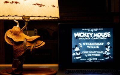In a photo illustration, an episode of Disney's Steamboat Willie that was the debut of Mickey Mouse is seen on a laptop on January 02, 2024 in Austin, Texas. As of New Year's Day, the copyright for the earliest Mickey Mouse iteration 'Steamboat Willie' has expired, entering the public domain. The expiration of 'Steamboat Willie' does not affect more modern versions of the character. (Photo illustration by Brandon Bell/Getty Images)