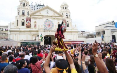 LIFTING IT UP A devotee raises a replica of the Black Nazarene during a first Friday mass in Quiapo, Manila, on Friday, Jan. 5, 2024. The Feast of the Black Nazarene is on Tuesday, January 9, and is expected to draw millions into a procession of the image around Manila, which is believed to be miraculous. The annual religious event is considered one of the biggest in the Philippines, where 80 percent of the population are Catholics. PHOTO BY RENE H. DILAN