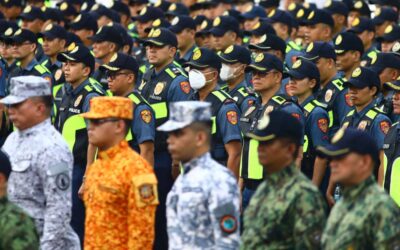 Members of the Philippine National Police, Armed Forces of the Philippines, Philippine Coast Guard, Bureau of Fire Protection and Hijos Del Nazareno are blessed by Rev. Fr. Rufino Sescon Jr., rector and parish priest of the Minor Basilica and National Shrine of the Black Nazarene, during a send-off ceremony for the Feast of the Black Nazarene 2024 at the Quirino Grandstand in Manila, on January 6, 2024. PHOTO BY MIKE ALQUINTO
