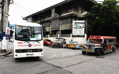 A modern public utility vehicle (MPUV) and traditional passenger jeep (PUJ) are seen waiting for passengers at the corner of Leon Guinto Street in Manila. PHOTO:MIKE ALQUINTO
