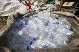Workers clean and segregate plastic bottles inside a junk shop in Manila on Thursday, June 1, 2023. World Environment Day on  June 5  focuses on solutions to plastic pollution under the campaign #BeatPlasticPollution. PHOTOS BY MIKE ALQUINTO