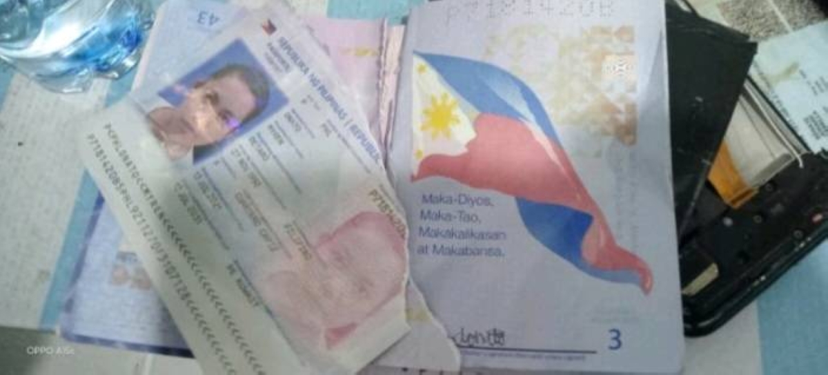 TORN APART The passport of Myren Onato is damaged by her husband on Wednesday, Jan. 10, 2024, to prevent her from leaving for Kuwait where she works. CONTRIBUTED PHOTO