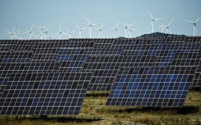 Renewable Energy Capacity Sees Significant Growth in 2023 This photograph shows photovoltaic solar panels and windmills in the background around the Spanish Navarre town of Milagro on April 5, 2023. Spain generated record 50% of power from renewables in 2023, AFP reports on January 4, 2024. ANDER GILLENEA / AFP