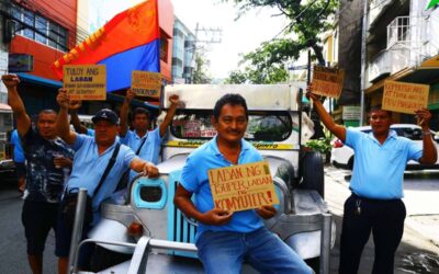 Jeepney drivers rally in Manila. PHOTO BY MIKE ALQUINTO