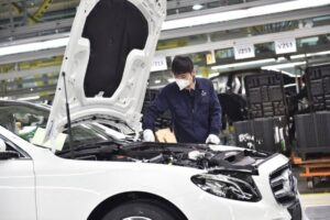 SAFETY FIRST This file photo shows a staff member working at a factory of Beijing Benz Automotive. Co. Ltd. in Beijing, capital of China, on Feb. 21, 2020. Mercedes-Benz (China) Automotive Sales Co. has initiated a recall of over 10,000 imported cars from the Chinese market over safety concerns, said the country's top quality watchdog. XINHUA PHOTO
