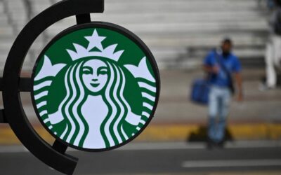 (FILES) In this file photo taken on December 23, 2021 the Starbucks logo is see at a supermarket in Las Mercedes district in Caracas. - McDonald's, Coca-Cola and Starbucks on Tuesday bowed to public pressure and suspended their operations in Russia, joining the international corporate chorus of outrage over Moscow's invasion of Ukraine.
Several of these companies, symbols of American cultural influence in the world, have been the subject of boycott calls on social media as investors have also begun to ask questions about their presence. (Photo by Federico PARRA / AFP)