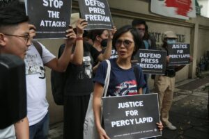 One year after the killing of radio broadcaster Percival 'Percy Lapid' Mabasa, the National Union of Journalists of the Philippines (NUJP), and the Freedom for Media, Freedom for All (FMFA) lead other groups in gathering in front of the Department of Justice (DoJ) office in Manila on Tuesday, Oct. 3, 2023 to renew their call for justice.
PHOTO BY RENE H. DILAN