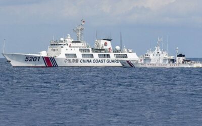 Philippines and China Seek Diplomatic Solutions to Ease Tensions in the South China Sea This photo taken on April 23, 2023 shows BRP Malapascua (right) maneuvering as a Chinese coast guard ship cuts its path at Second Thomas Shoal in the Spratly Islands. AFP PHOTO