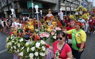 Devotees of the Sto. Nino hold a procession in Tondo, Manila on Saturday, Jan. 20, 2024, a day before the actual feast. The religious event is celebrated every third Sunday of January to commemorate the birth of Catholicism in the country more than 500 years ago. PHOTOS BY RENE H. DILAN