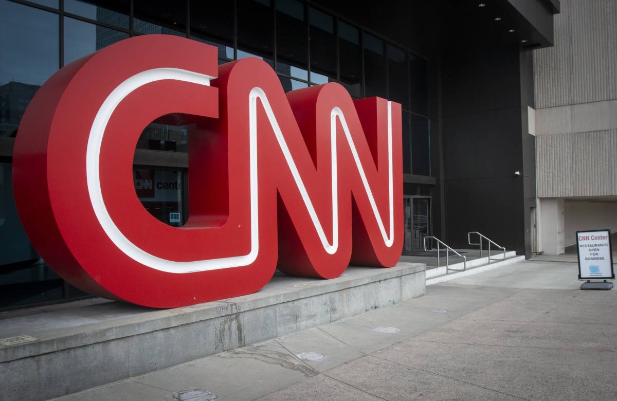 TANKING The CNN logo is displayed at the entrance to the CNN Center in Atlanta on Feb. 2, 2022. Cable news ratings are down across the board compared to 2022. AP PHOTO