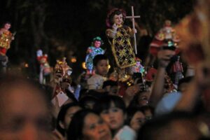 Devotees hold images of Sto. Niño during the Dinagyang Festival in Iloilo City on January 27, 2024. Devotees dance and sing to express their gratitude and devotion to the Sto. Niño or the Infant Jesus. PHOTOS BY MIKE ALQUINTO