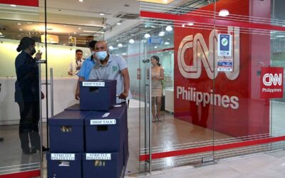 CNN Philippines Employees Receive Severance Pay as Company Ceases Operations People walk past the CNN Philippines office in Mandaluyong, Metro Manila on January 29, 2024. The CNN Philippines officially announced that it will stop news production operations effective on January 31, as a result of “serious financial losses”. JAM STA ROSA / AFP