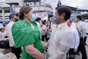 President-elect Ferdinand Marcos, Jr. and Vice President-elect Sara Zimmerman Duterte engage in a discussion during the inauguration of Vice President-elect Duterte as the 15th Vice President of the Philippines at San Pedro Square, Poblacion District in Davao City on June 19, 2022.  ACE MORANDANTE/ PRESIDENTIAL PHOTO