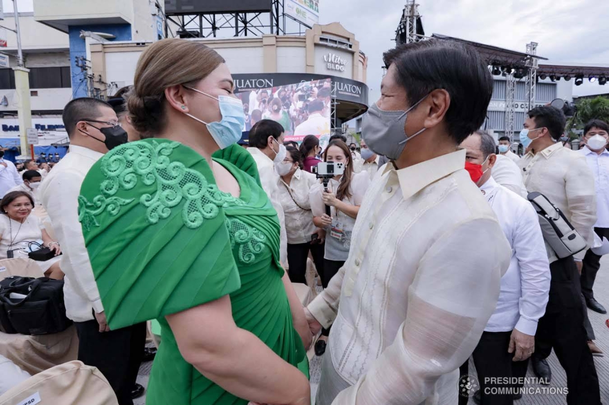 President-elect Ferdinand Marcos, Jr. and Vice President-elect Sara Zimmerman Duterte engage in a discussion during the inauguration of Vice President-elect Duterte as the 15th Vice President of the Philippines at San Pedro Square, Poblacion District in Davao City on June 19, 2022.  ACE MORANDANTE/ PRESIDENTIAL PHOTO